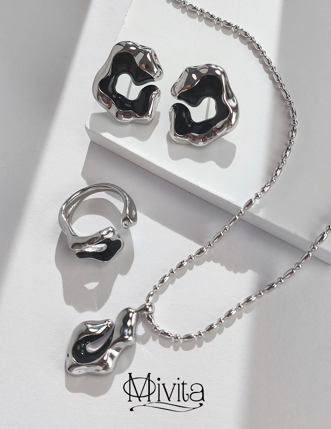 Moivita Sterling Silver Drip Glaze Necklace - Contemporary Elegance with Intricate Sculptural Details